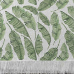 Alfombra tejida con diseño botánico, hojas de plátano en acuarela.