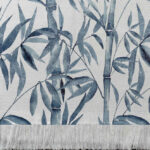 Alfombra tejida diseño botánico cañas pintadas en acuarela, tonalidades azules.