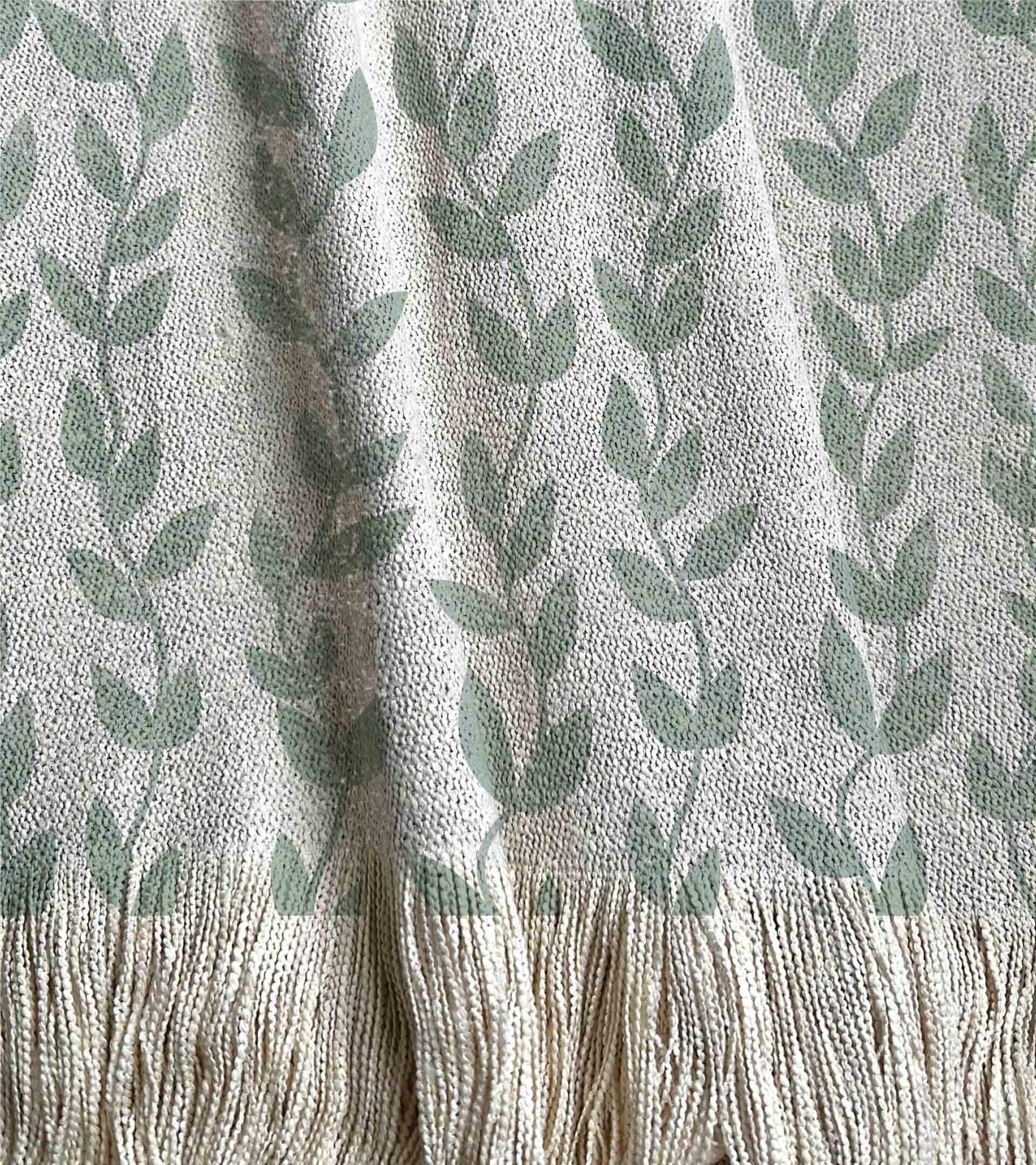Manta tejida con enredadera de coló verde, hojas pequeñas
